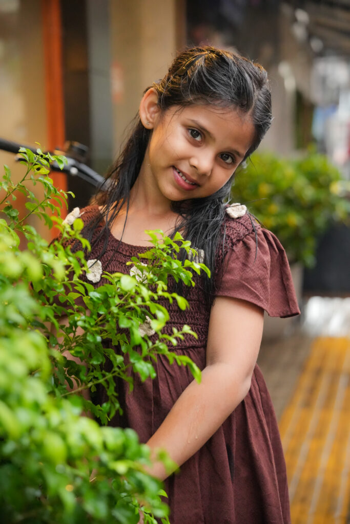 Birthday month kids photoshoot at Fort Kochi featuring a baby girl visiting Kerala from Pune
