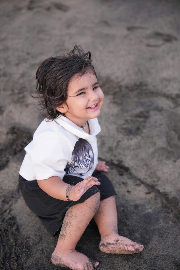 Kids beach photoshoot in Kochi featuring a 1.6-year-old baby girl during a Kerala family vacation