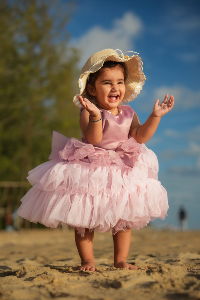 Kids beach photoshoot in Kochi featuring a 1.6-year-old baby girl during a Kerala family vacation