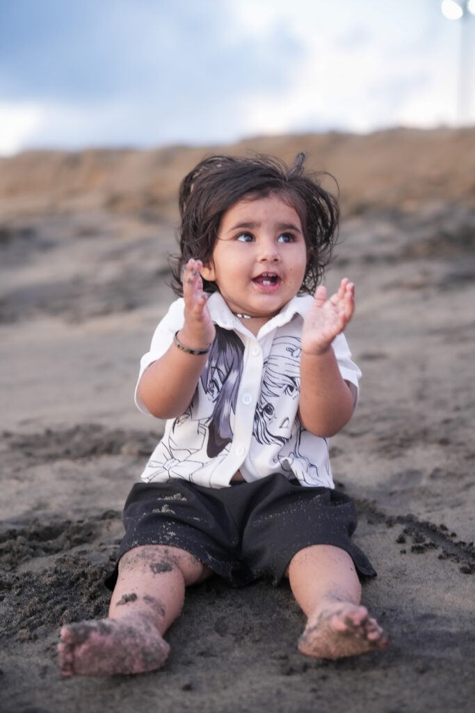 Kids beach photoshoot in Kochi featuring a 1.6-year-old baby girl during a Kerala family vacation