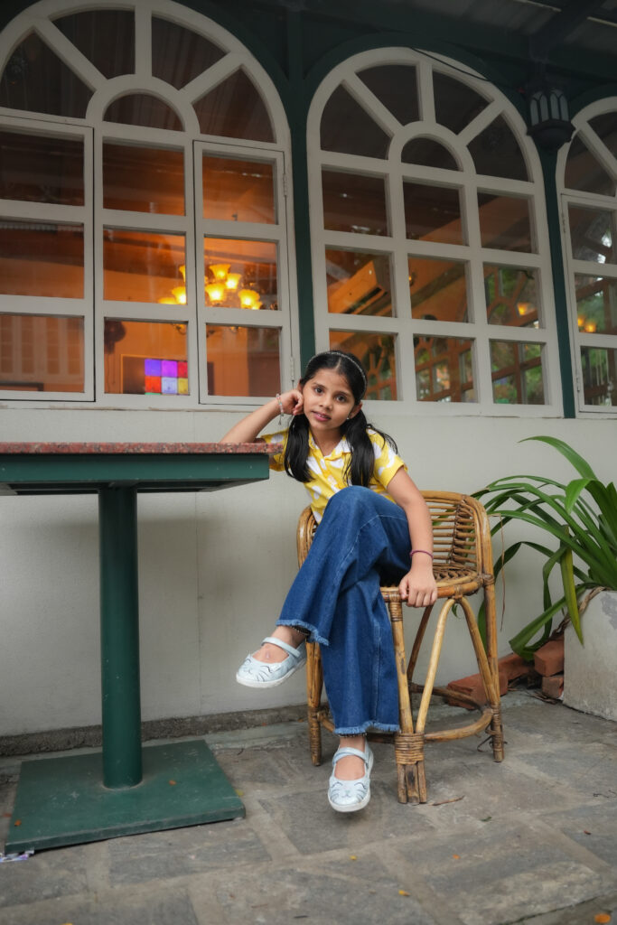Birthday month kids photoshoot at Fort Kochi featuring a baby girl visiting Kerala from Pune