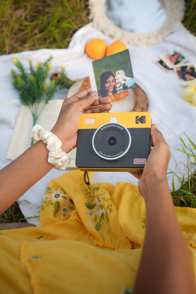 Creative self portrait photoshoot in Kochi featuring a soft picnic theme with natural lighting, aesthetic styling and cinematic lifestyle photography. Captured with dreamy outdoor compositions and candid storytelling elements, creating elegant and artistic portrait visuals inspired by minimal and creative photography trends in Kerala.