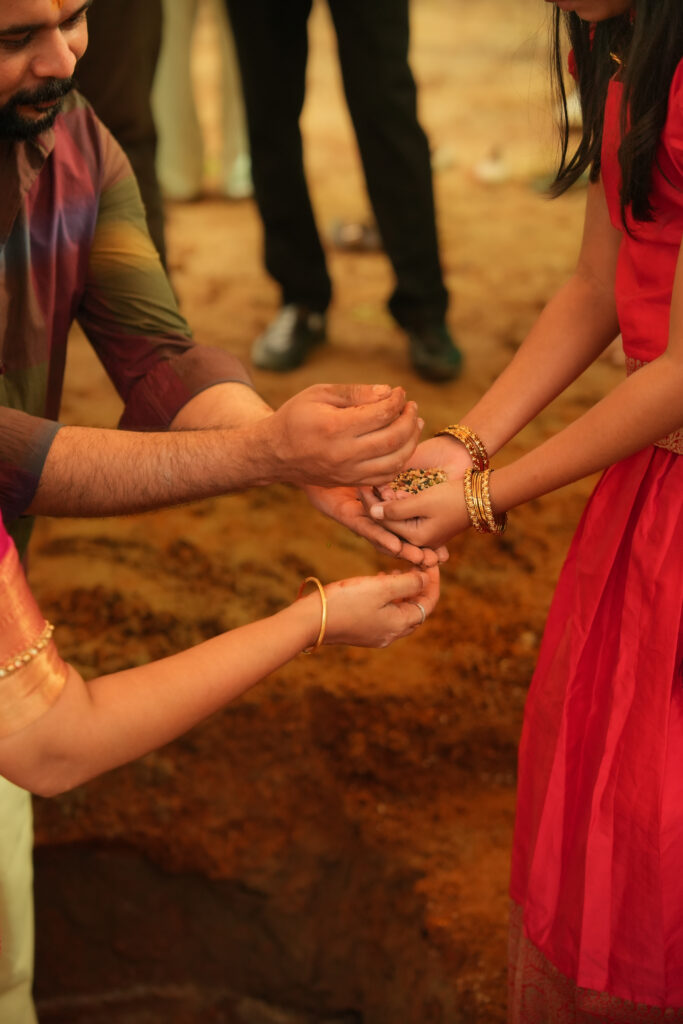 Traditional Kallidal ceremony photography in Kochi with sacred pooja and first stone laying rituals.