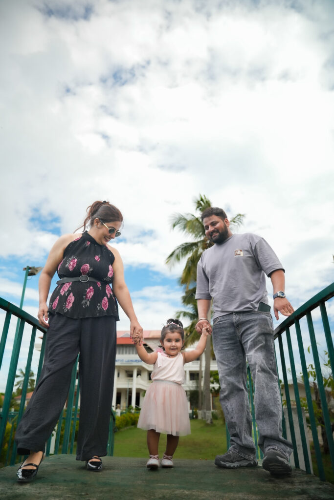 1.6-year-old baby girl enjoying a resort photoshoot during a family trip to Kochi