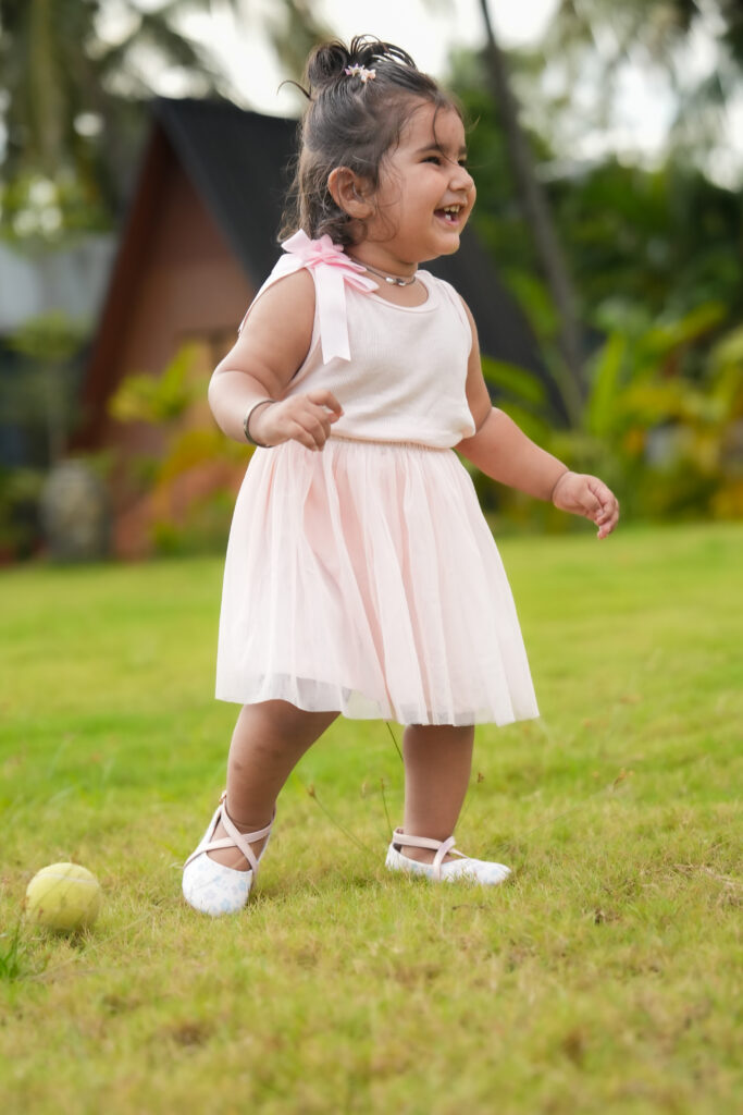 Kids resort photoshoot in Kochi featuring a 1.6-year-old baby girl during a family vacation from Madhya Pradesh