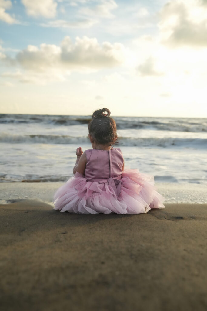 Kids beach photoshoot in Kochi featuring a 1.6-year-old baby girl during a Kerala family vacation