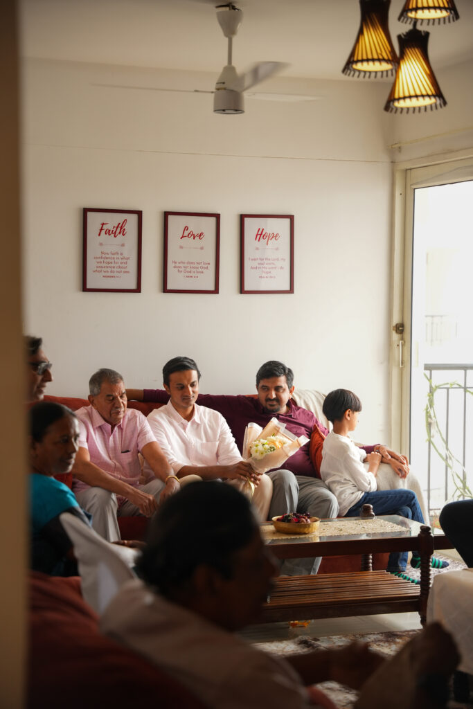 Candid Pennukaanal photography in Kochi capturing a bride-to-be with family during a traditional Kerala marriage meeting
