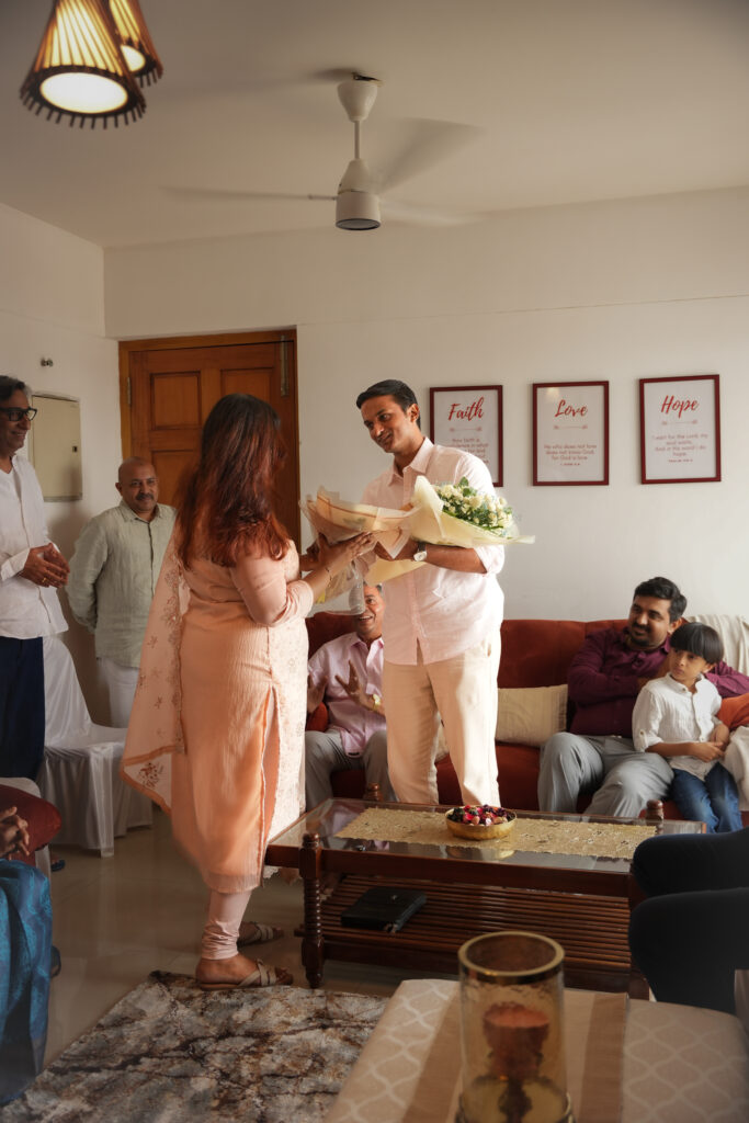 Candid Pennukaanal photography in Kochi capturing a bride-to-be with family during a traditional Kerala marriage meeting
