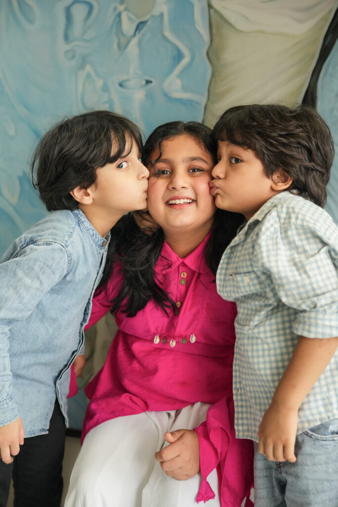 Candid kids photography in Kochi capturing a child’s natural smile and playful moments