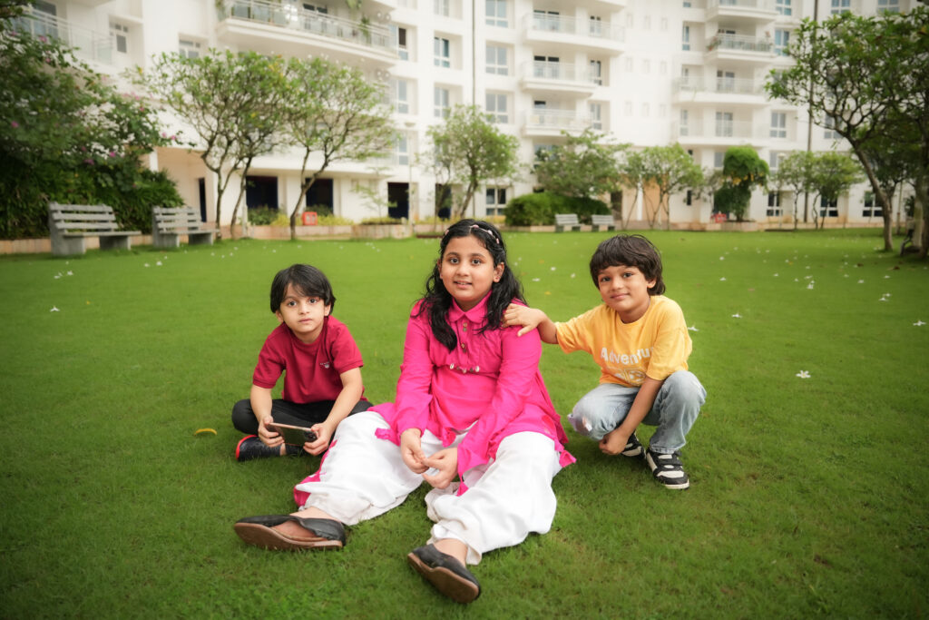 Candid kids photography in Kochi capturing a child’s natural smile and playful moments