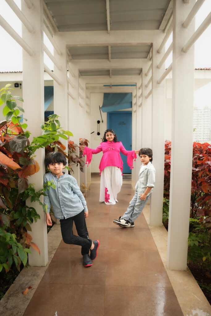 Candid kids photography in Kochi capturing a child’s natural smile and playful moments